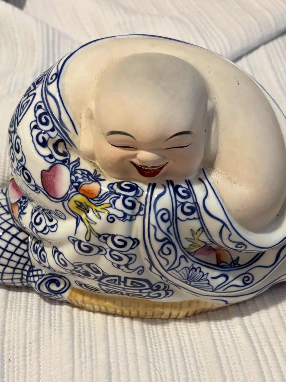 Blue & White Ceramic Laughing Buddha Figurine with Floral Accents